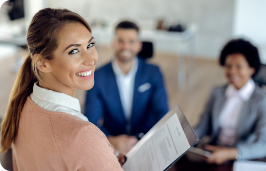 An executive recruiter presents a document to a group of people.